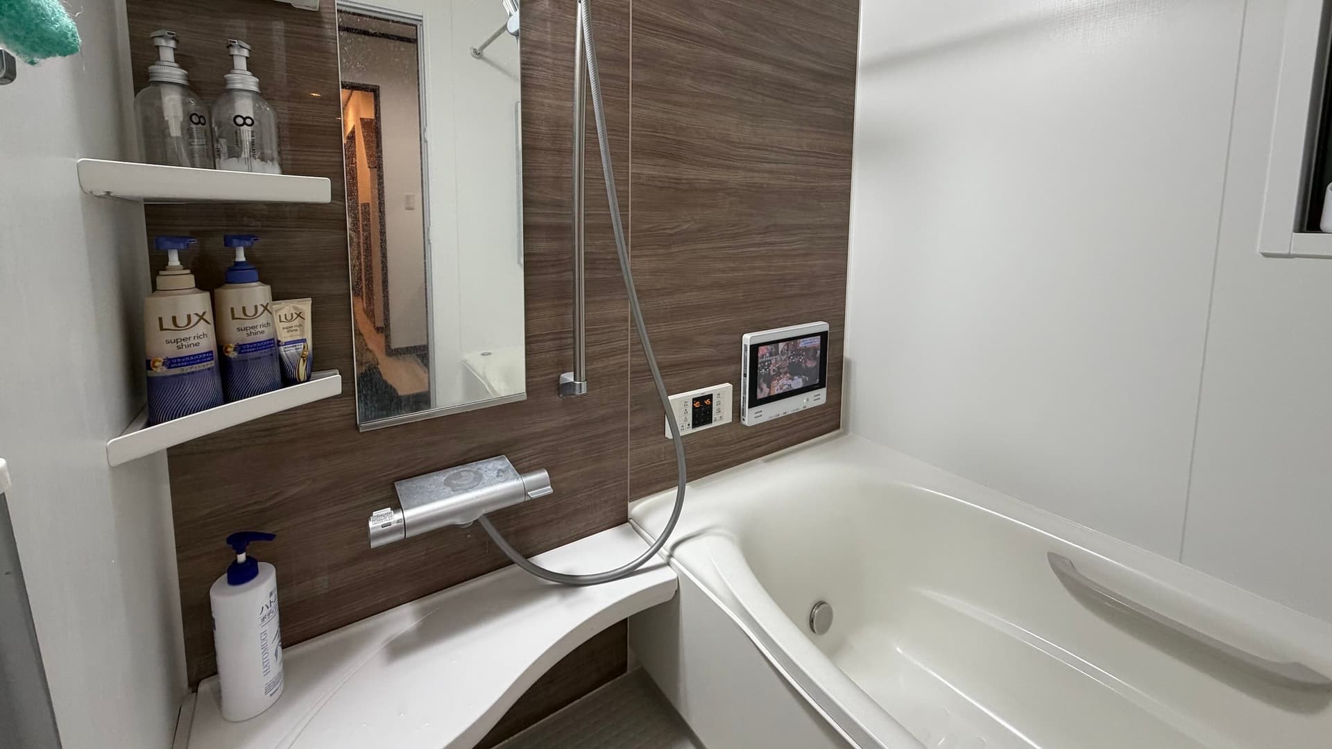 Bon House Tokyo bathroom with TV - relaxing bath experience