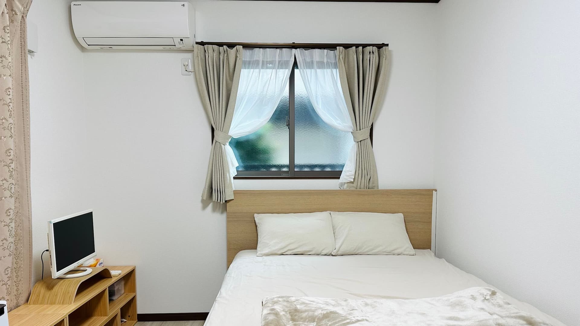 Bon House Tokyo bedroom with natural window view